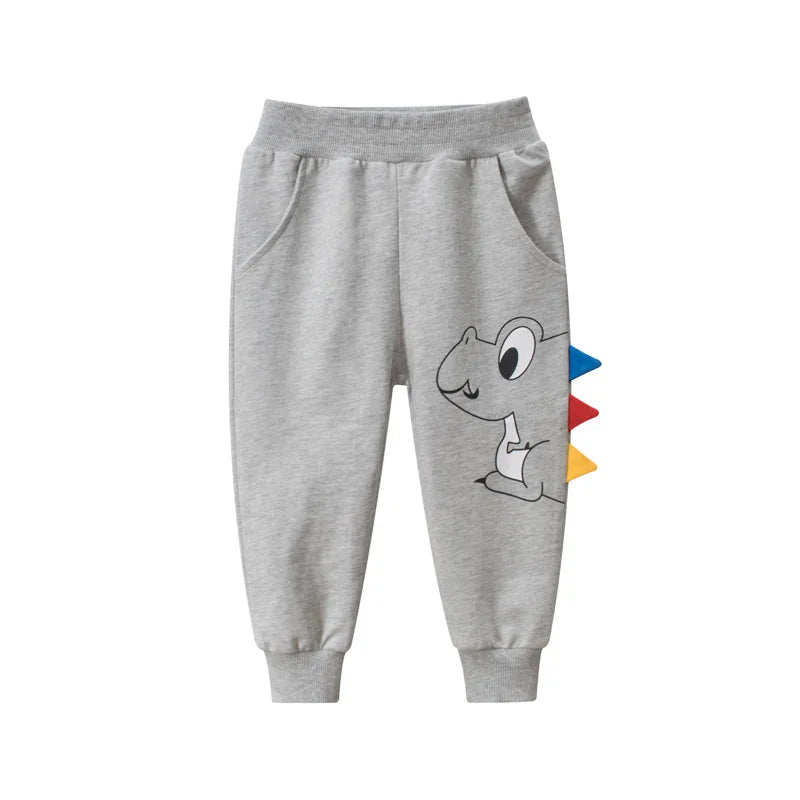 2025 Kids Long Pants 100% Cotton Lovely Dinosaur Cartoon Boys Girls Sport Trousers Sweatpants Suitable for Spring and Autumn