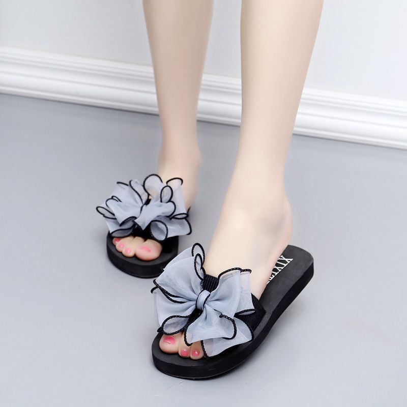 Mid-summer high-heeled slipper butterfly flower women's beach shoes thick-soled sandals and slippers Korean-style non-slip slippers for women