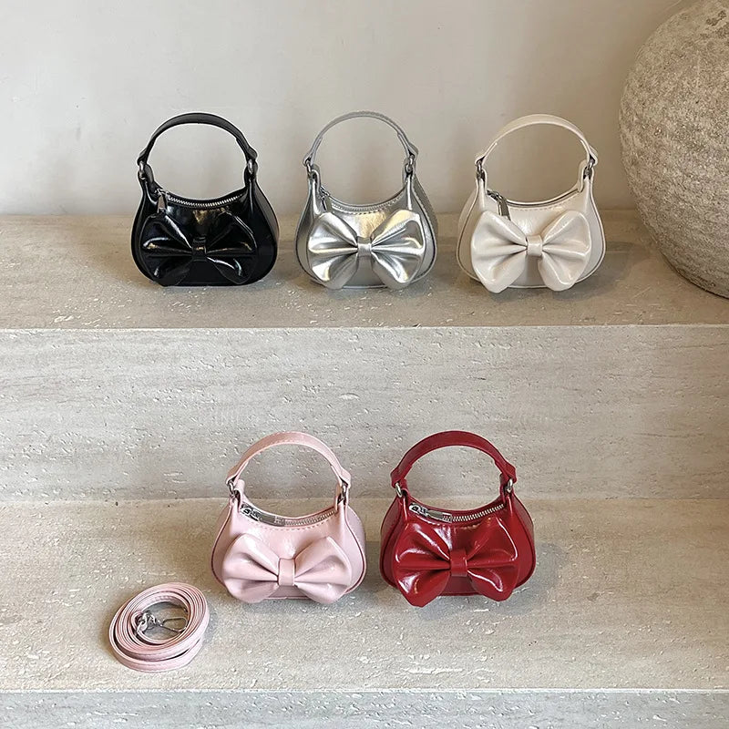 2026 New Kids Girls Cute Bowknot Handbag Fashion Crossbody Bag Detachable Strap Mini Shoulder Bag for Children Stylish Purse
