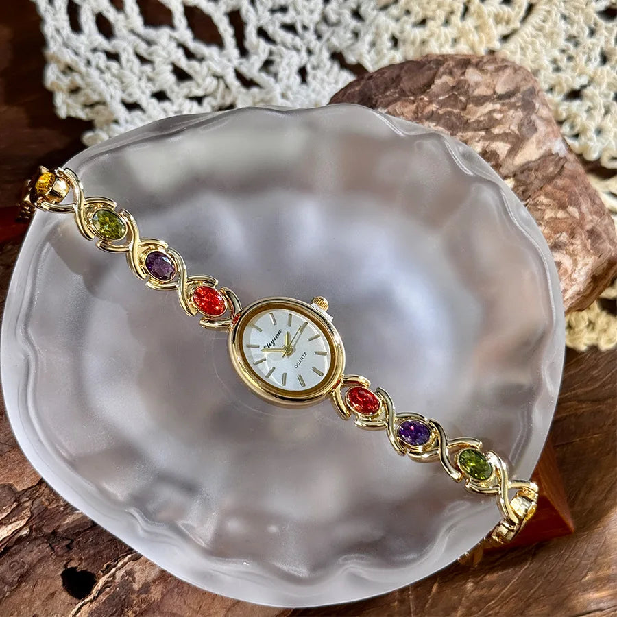 Exquisite ladies' watch with oval gemstone and diamond inlay, compact vintage rainbow women's watch