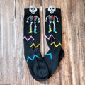 Halloween Socks for Kids Skeleton Skull Print Knee High Socks Black Boys Girls Bones Spooky Gift Ideas Carnival Theme Party