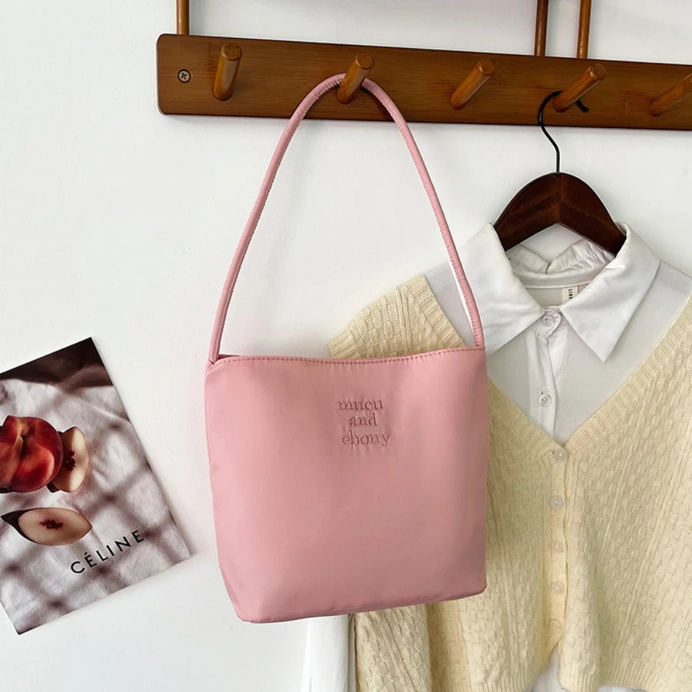 Summer new simple nylon underarm bag Korean niche design alphabet embroidery portable commuter bucket bag