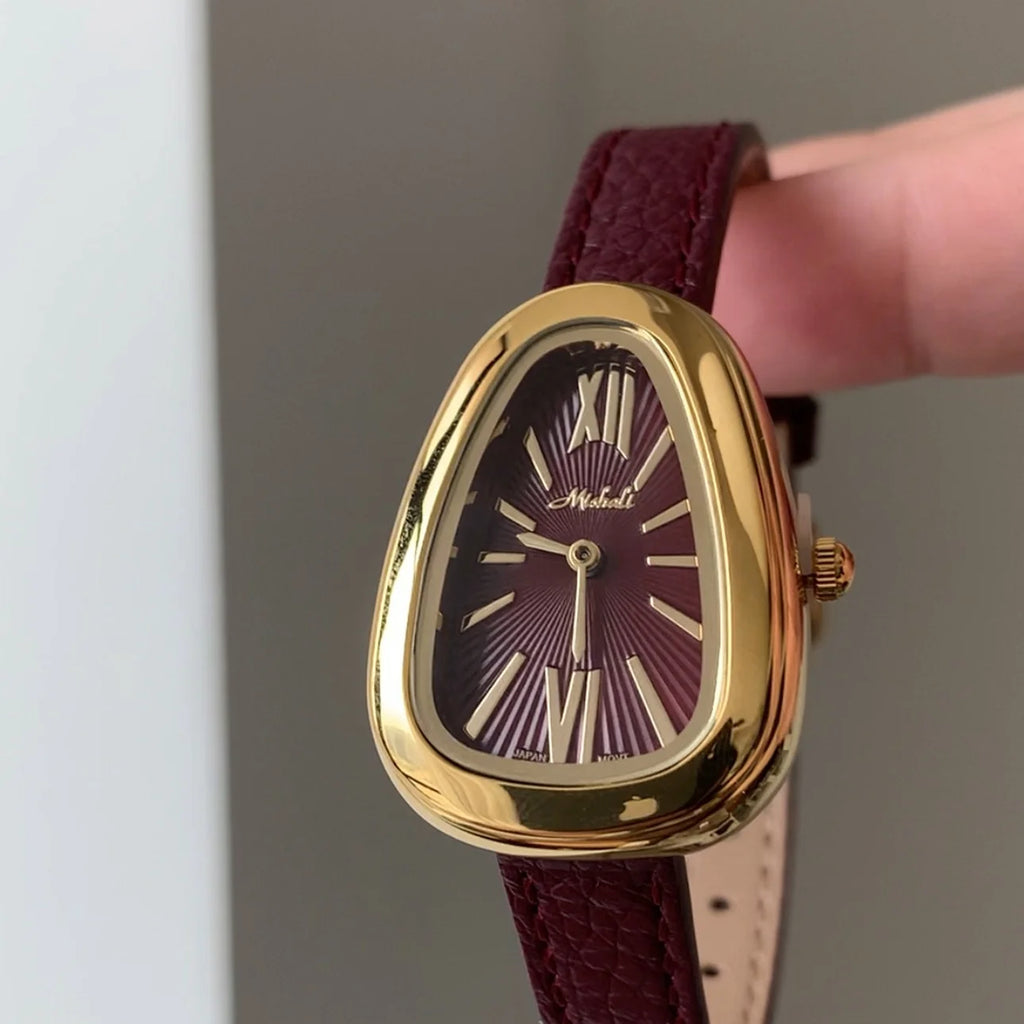 2025 new snake shaped women's watch with genuine leather strap, vintage watch with Roman numerals light luxury