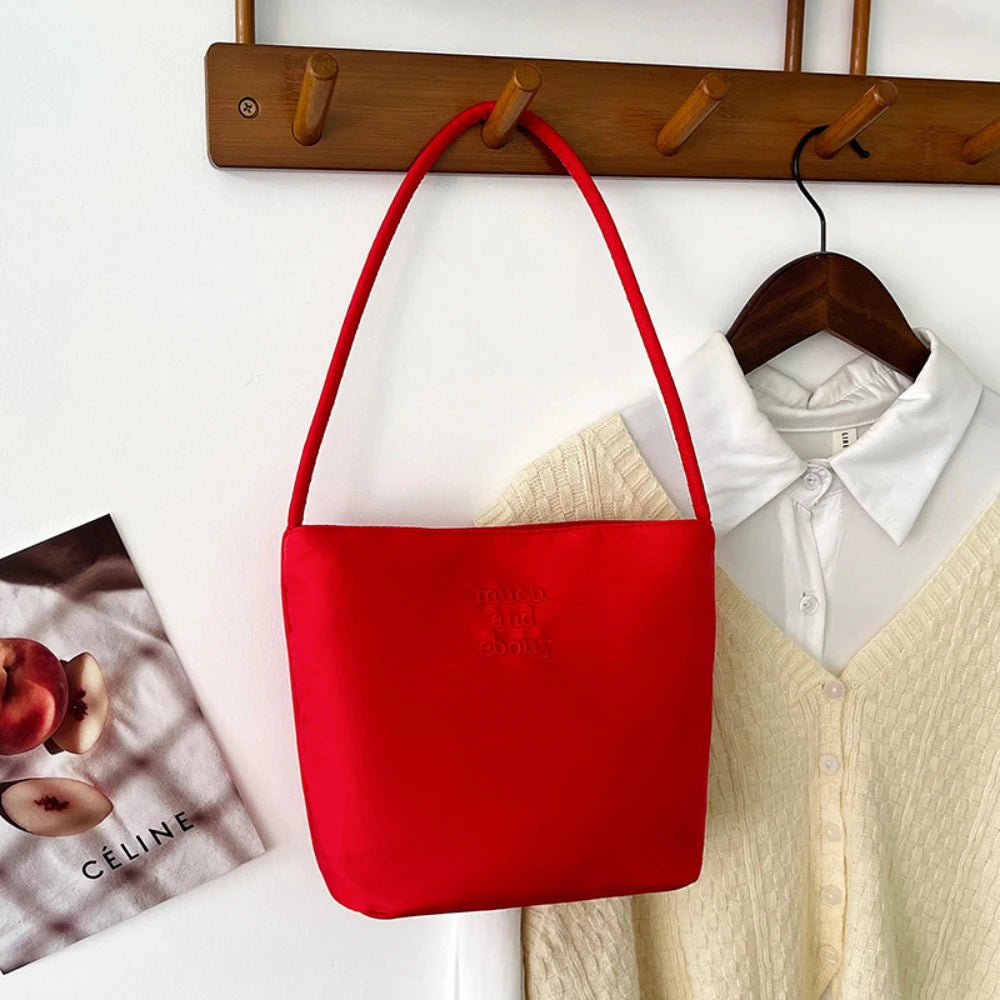 Summer new simple nylon underarm bag Korean niche design alphabet embroidery portable commuter bucket bag