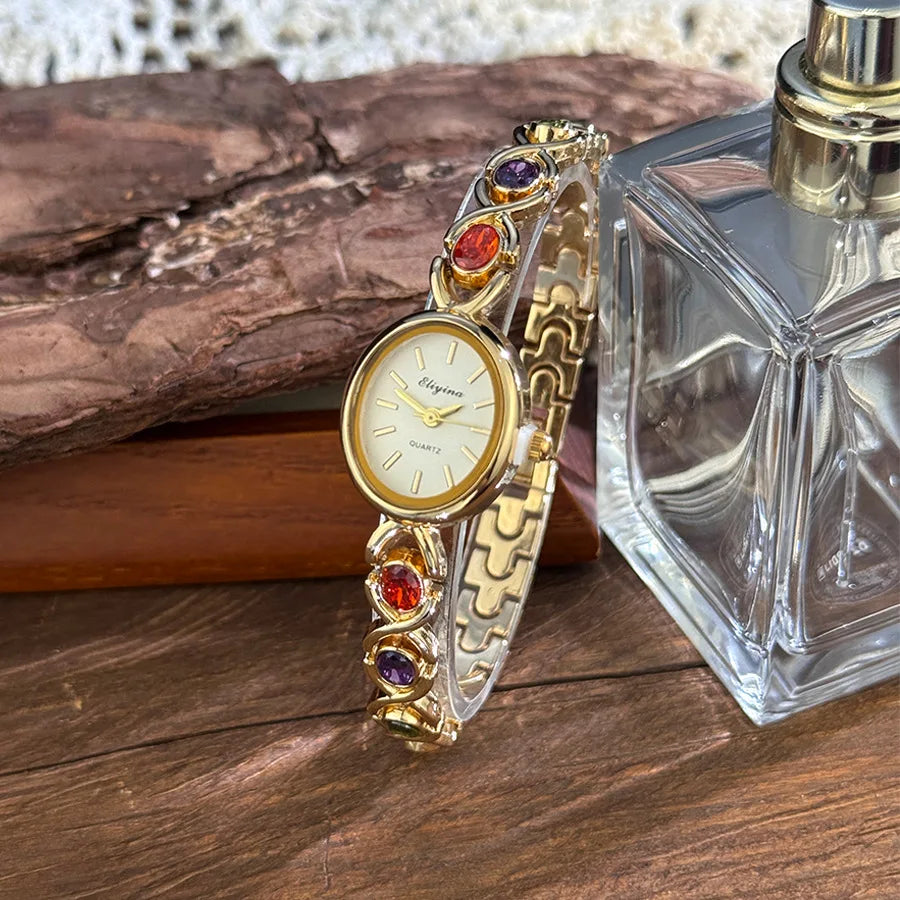 Exquisite ladies' watch with oval gemstone and diamond inlay, compact vintage rainbow women's watch