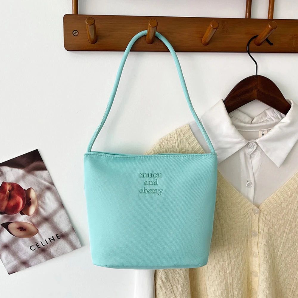 Summer new simple nylon underarm bag Korean niche design alphabet embroidery portable commuter bucket bag